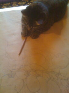 my tired but trusty studio assistant inspecting the maquette